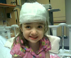 Child with bandaged head