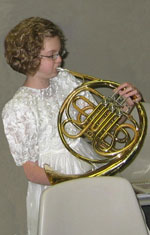 Girl Playing French Horn