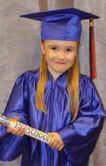 Little Girl in Cap and Gown