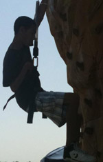 Child rock climbing