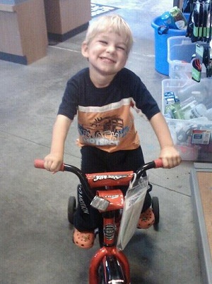 Boy with Hemiplegic Cerebral Palsy Riding Bike