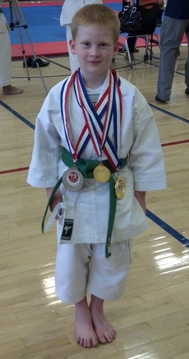 Boy with hemiplegia wins karate contest
